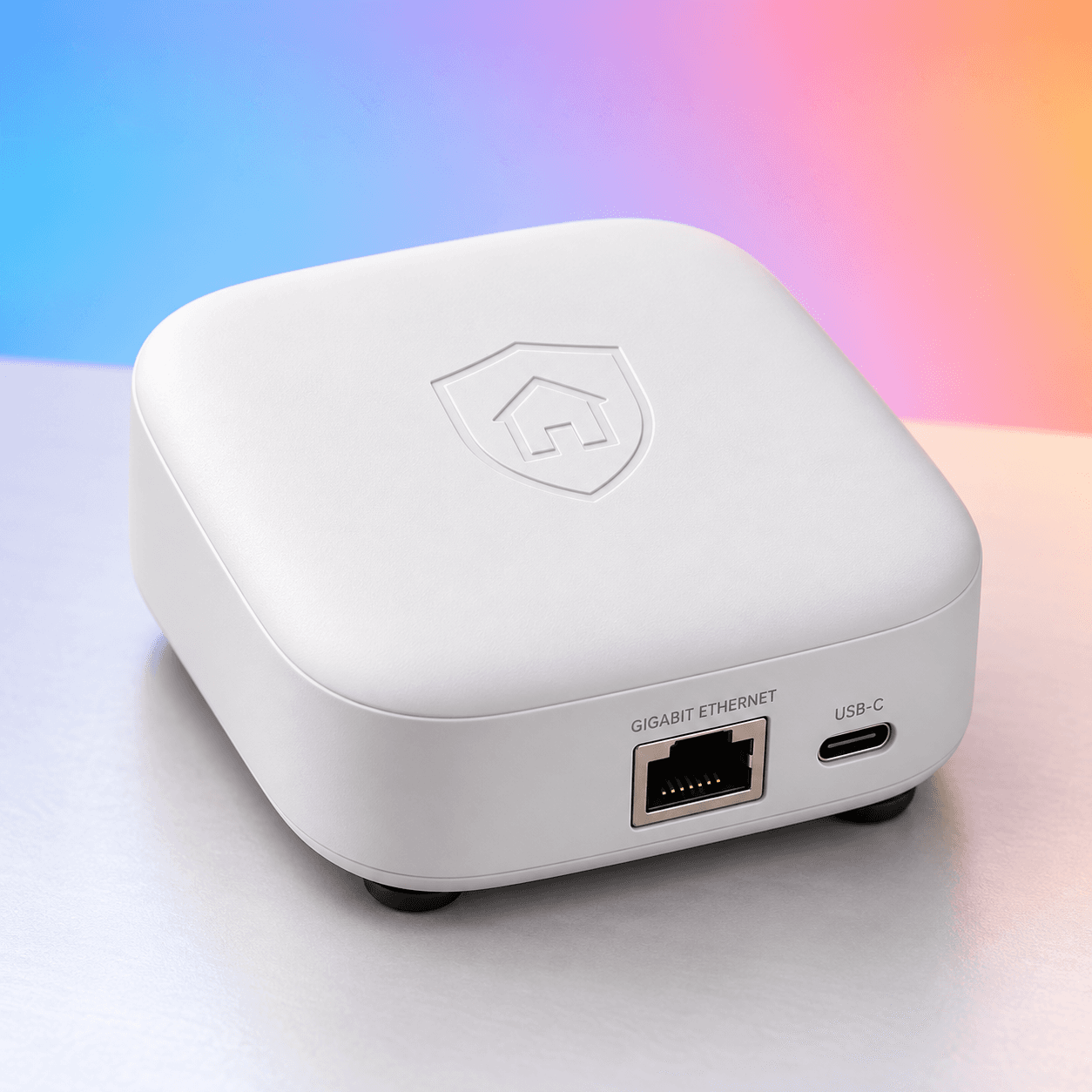 White HomeVault VPN with recessed house shield mark and Ethernet and USB-C ports
